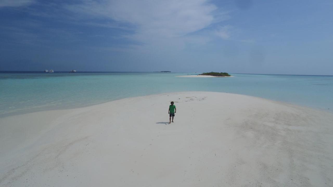 Thoddoo Beach Holiday Экстерьер фото