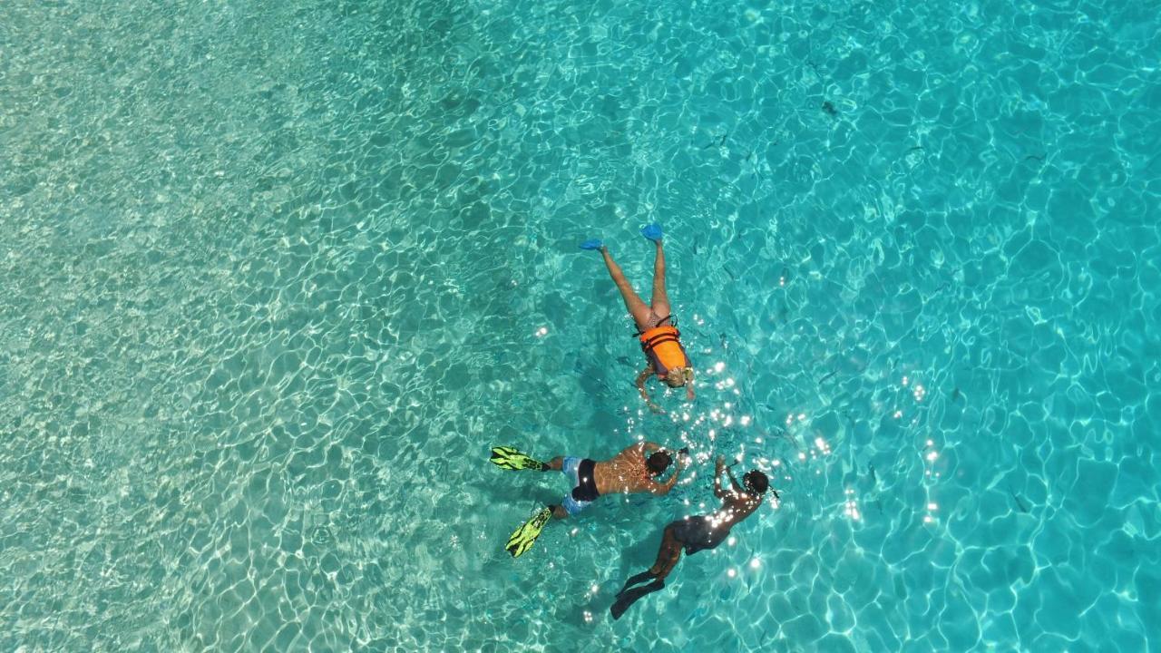 Thoddoo Beach Holiday Экстерьер фото