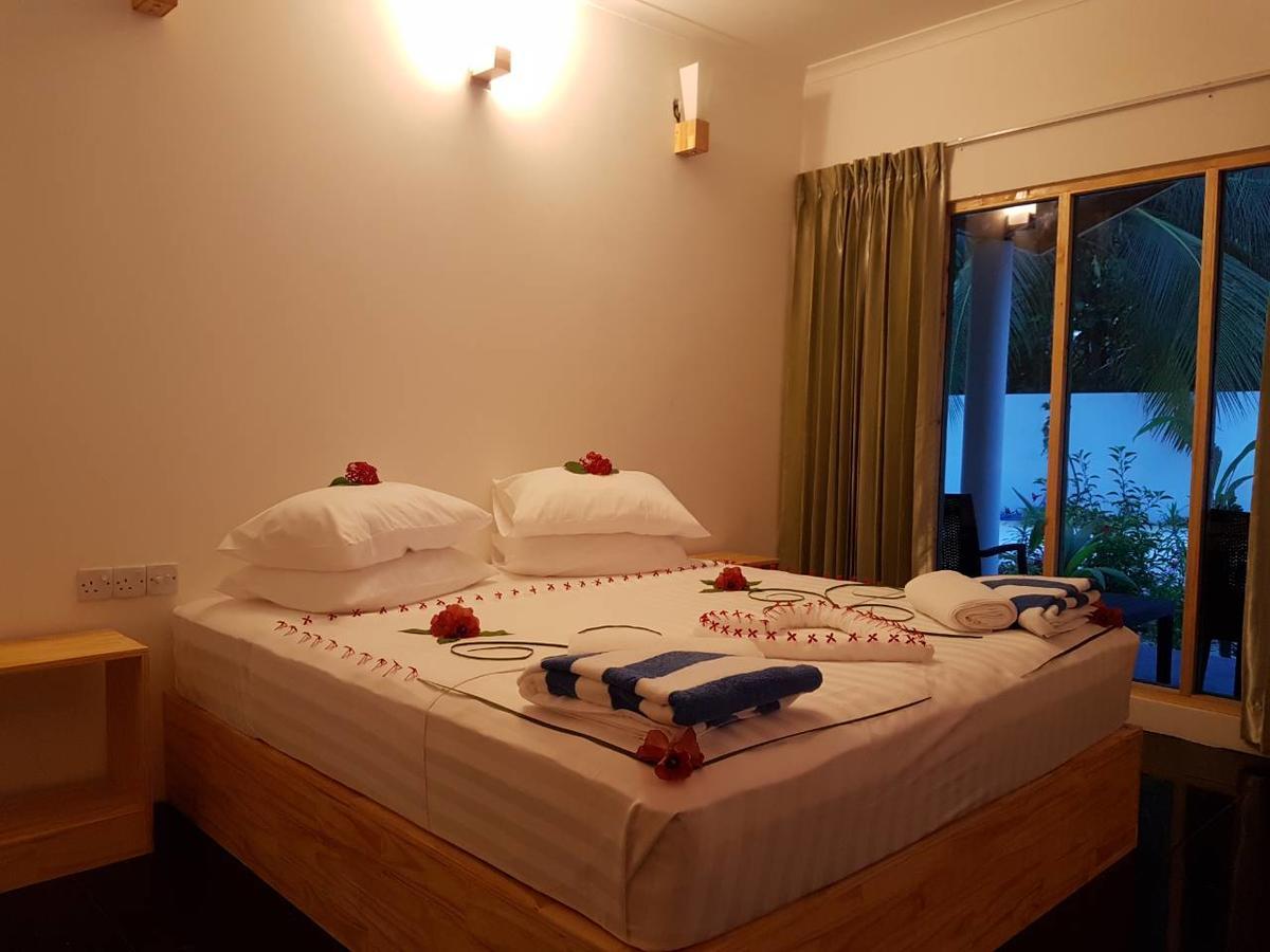 Thoddoo Beach Holiday Экстерьер фото