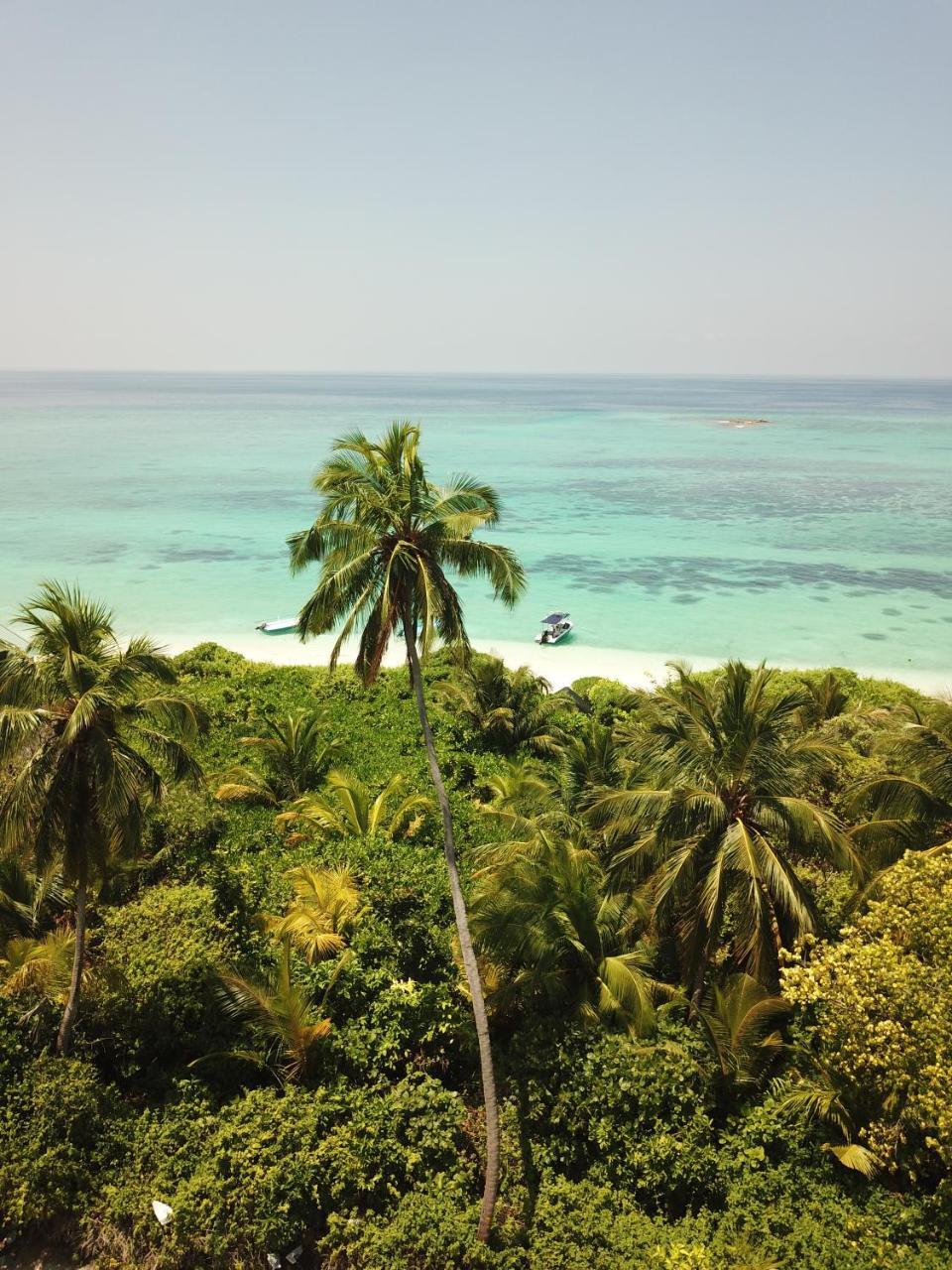 Thoddoo Beach Holiday Экстерьер фото