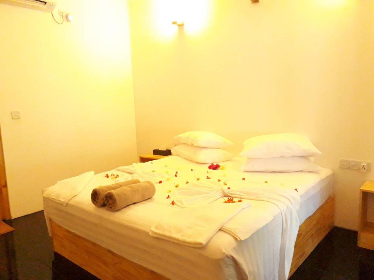 Thoddoo Beach Holiday Экстерьер фото