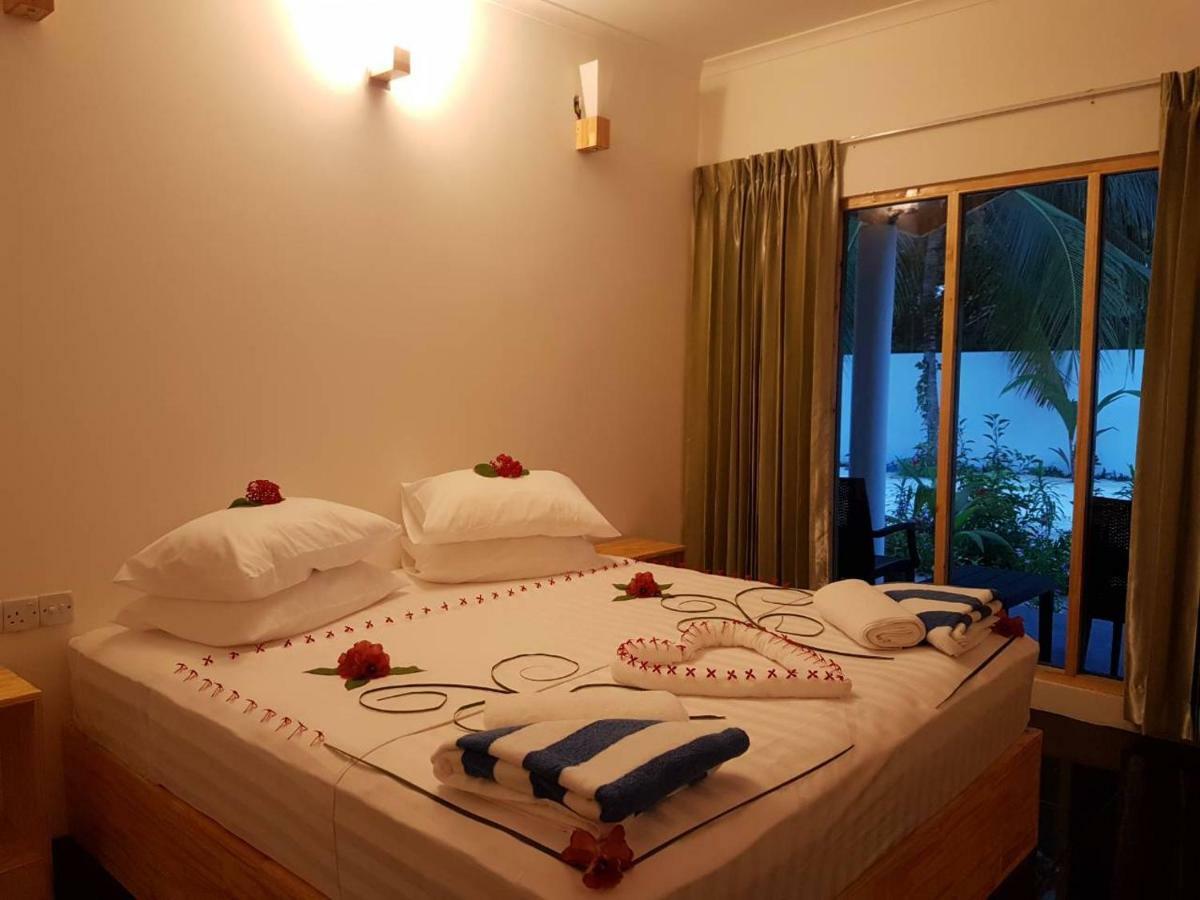 Thoddoo Beach Holiday Экстерьер фото